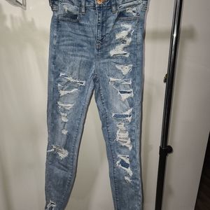 High waisted distressed jeans